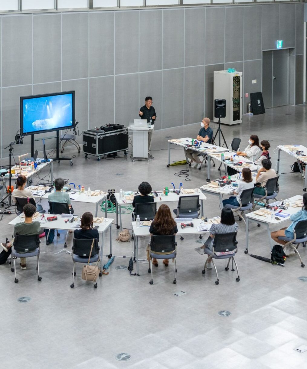 Home Aerial view of a spacious conference room setup for a business presentation.